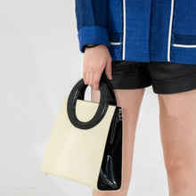 Load image into Gallery viewer, Christian Dior Vintage cream and black handbag with circular handles