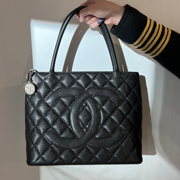 Chanel black quilted caviar leather medallion tote bag