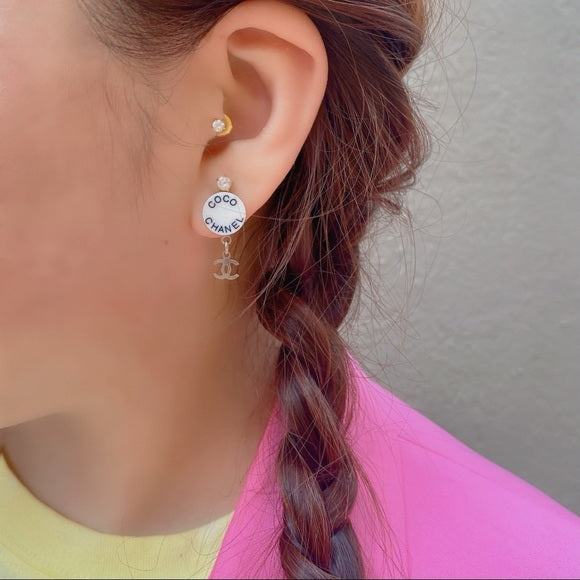 CHANEL White Logo earrings